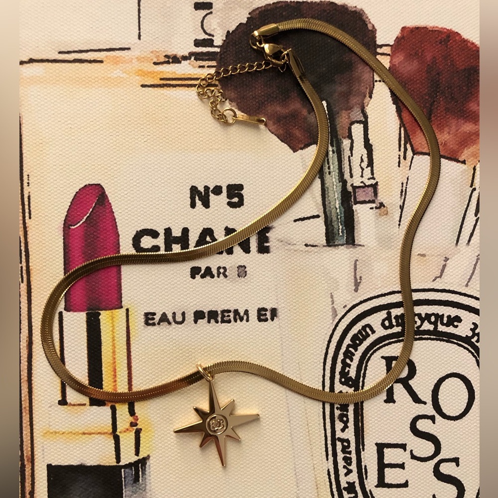 Authentic CHANEL Starburst Pendant/Charm onto Gold Plated Herringbone Necklace